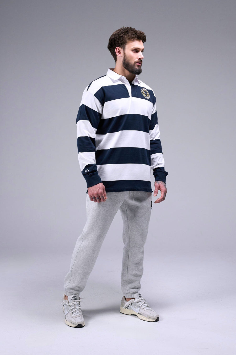 Side View Of Long Sleeve Rugby Shirt in Navy and White Stripe Color