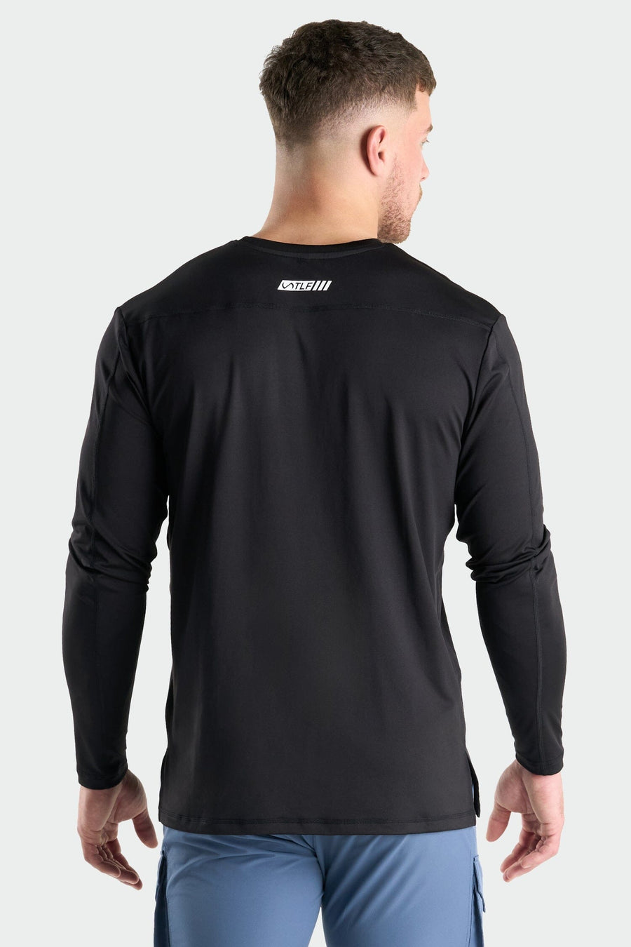 Back View of Black Train Infi Dry Long Sleeve