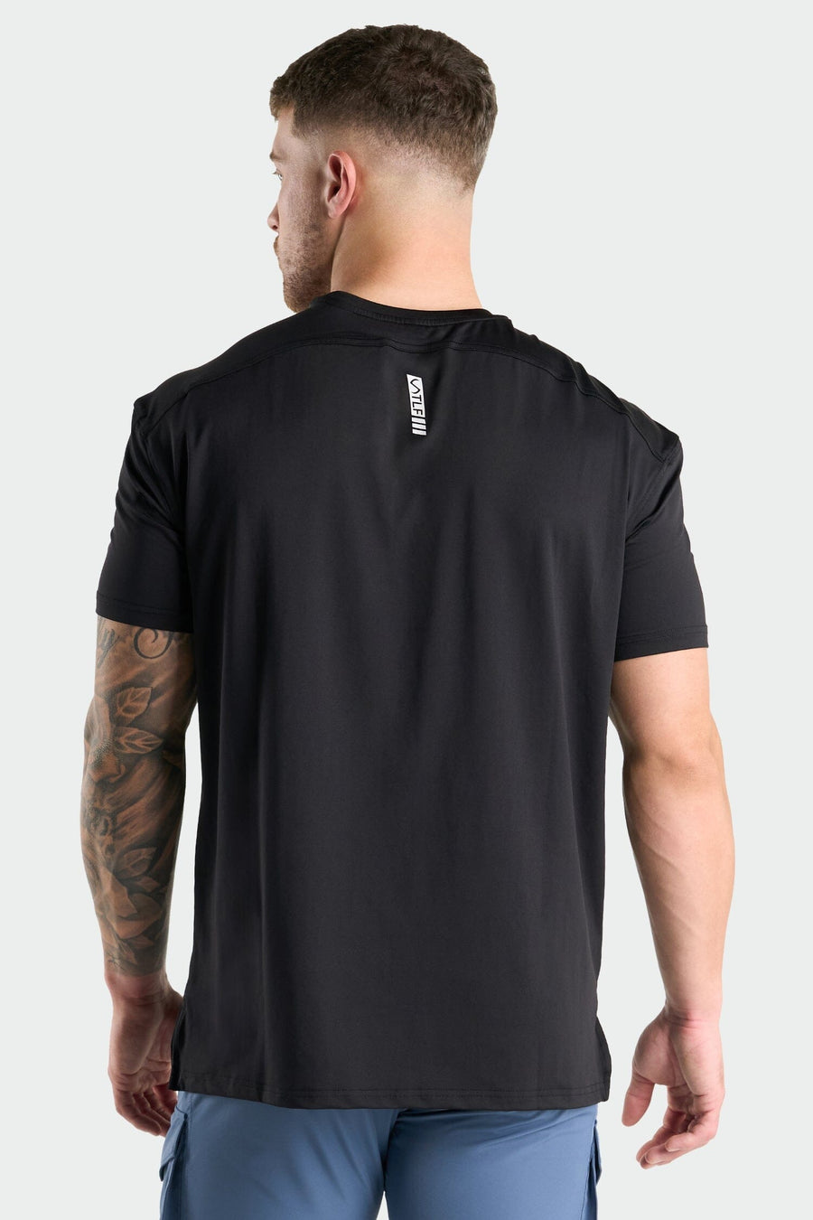 Back View of Black Train Infi Dry Swole Tee